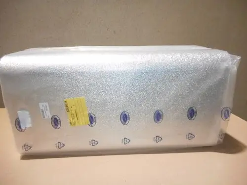 Verpacktes Isoliermaterial von Remeha mit glatter Oberfläche, in transparenter Folie eingeschweißt. Auf der Verpackung sind verschiedene Markierungen und ein Etikett zu erkennen.